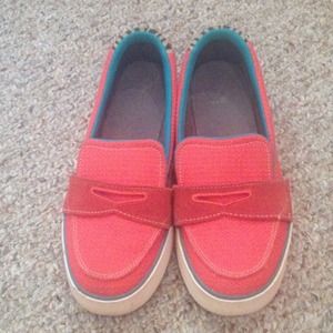 Coral/ pink nike slip on shoes