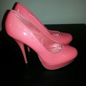 Neon pink pumps