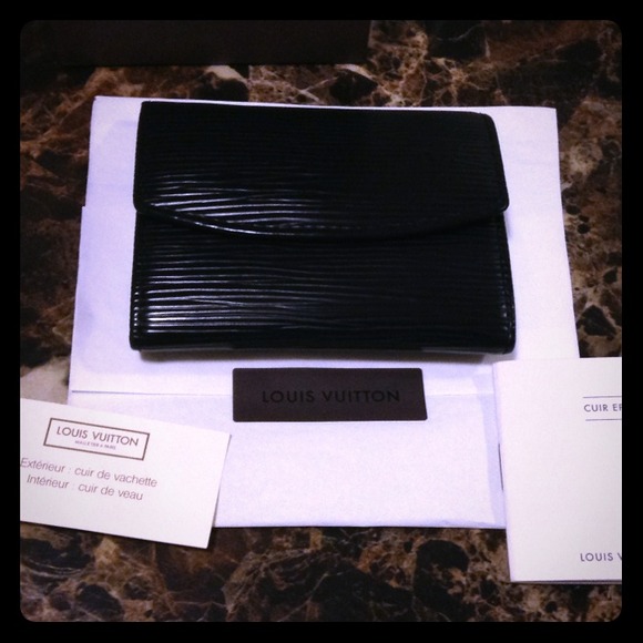 Sale $150 Authentic LV card/coins holder in epi