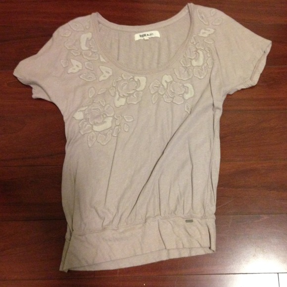 Soft beige/tan top. Floral embroidery