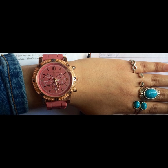 Rubber watch with stainless steel back & gold rim