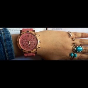 Rubber watch with stainless steel back & gold rim