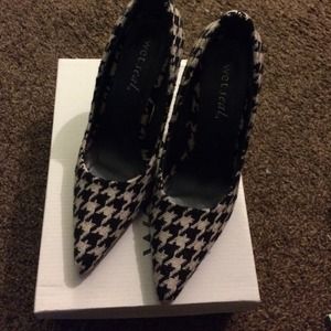Black and white pumps