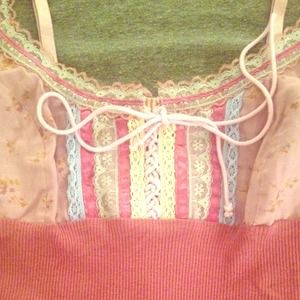 The prettiest Free People tank top. Size small.