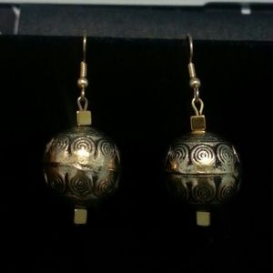 Gold toned ethnic ball earrings