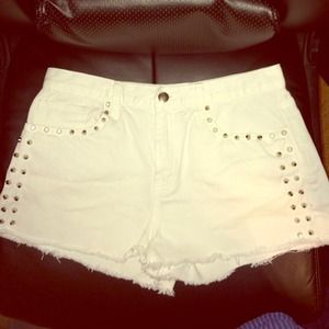 High-waisted studded white shorts