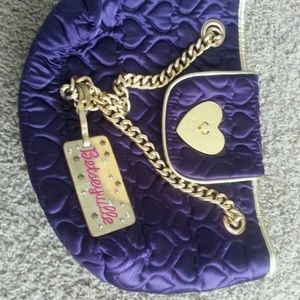 Purple Betsy johnson purse.