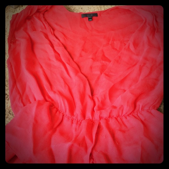 100% silk beautiful top. This top is red