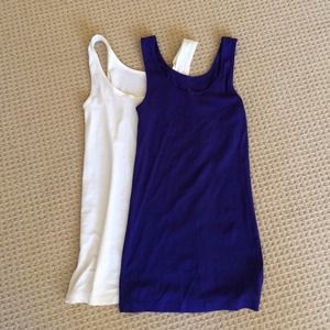 Never been worn. 2 Long and lean tanks