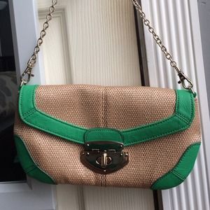 Green accented straw handbag