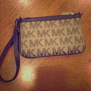 Purple Michael Kors Wristlet in great condition!