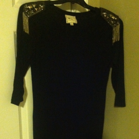 Black long sweater with shoulder detail