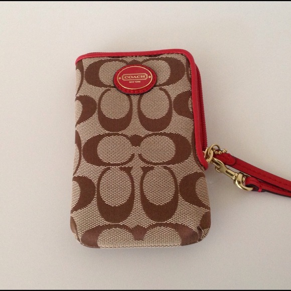 SOLD NWT COACH PHONE HOLDER SIGNATURE RED