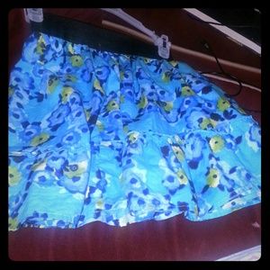 A blue skirt with yellow flowers