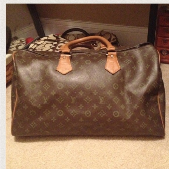 L v inspired duffle bag.