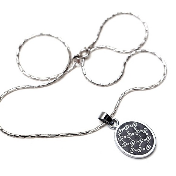 Gucci necklace with box.