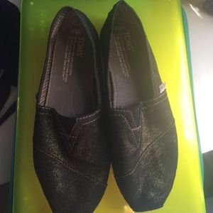 Black Toms with gold sparkles all over