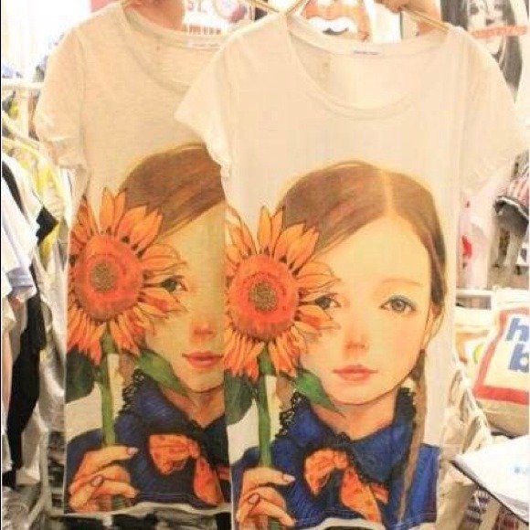 Ops with a cute doll and sunflowers - Picture 1 of 3