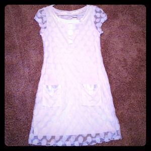 En focus studio simple white dress with pockets