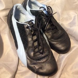 Excellent condition blue and black Puma sneakers