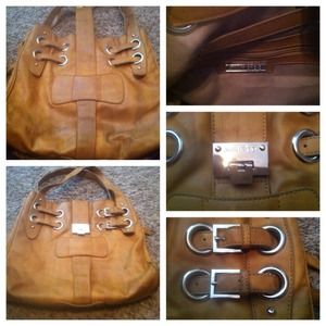 Plz someone help me is this jimmy choo purse real?