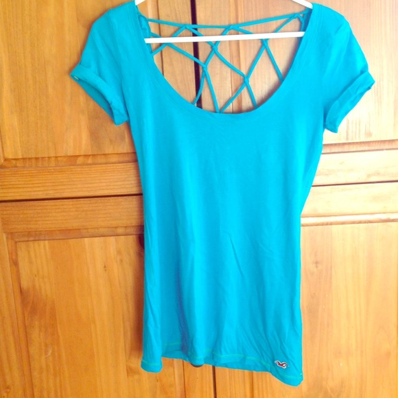 Blue deep cut shirt.