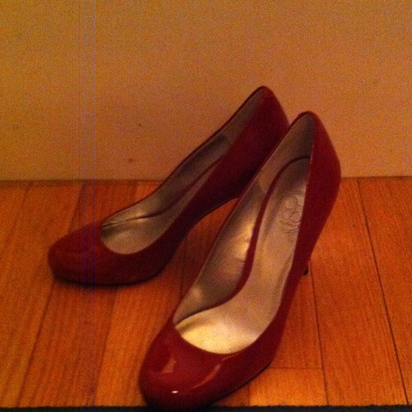 Red patent leather pumps