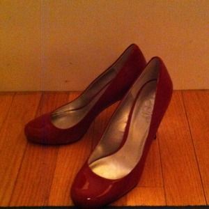Red patent leather pumps