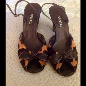 Leopard peep toe pumps
