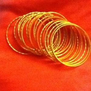 Gold and coral bracelets