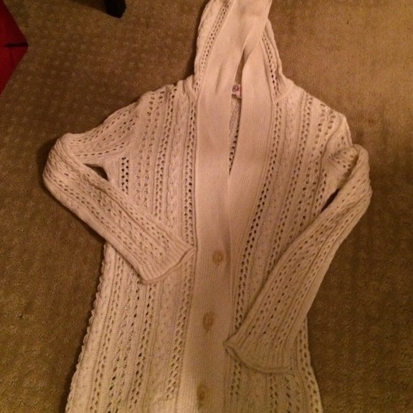 Hooded knit sweater.