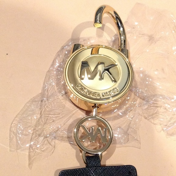 michael kors purse with lock and key