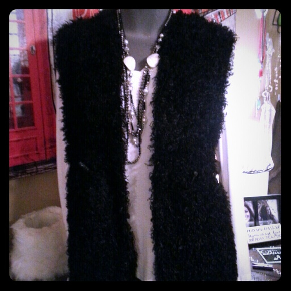 100% polyester sweater vest with hood