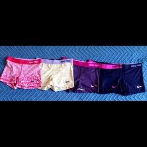 5 pairs of Nike Pro shorts