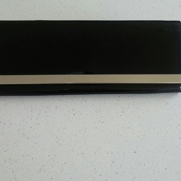 Aldo patent leather clutch