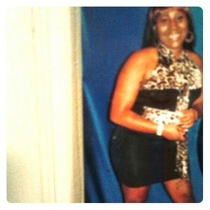 BEBE Sexy leopard an black bebe dress