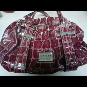 Authentic guess snake skin print purse maroon c