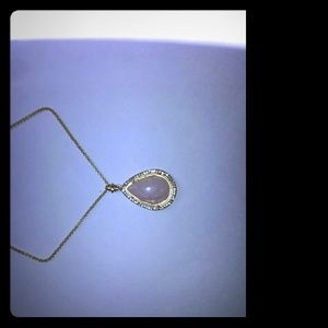 34"gold tone necklace with pink  pendant