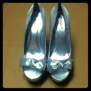 Size 7 Qupid  open toed silver high heel.