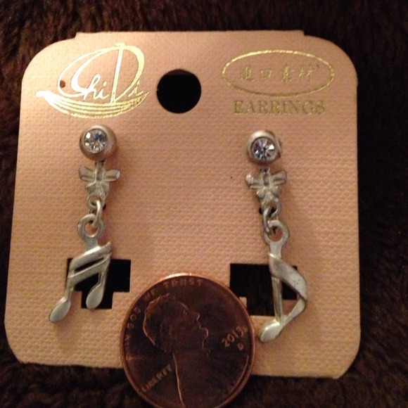 Silver tone musical notes pierced earrings