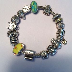 Silver pandora bracelet and charms