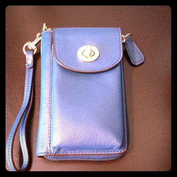 <<BRAND NEW>> Coach wristlet in teal.