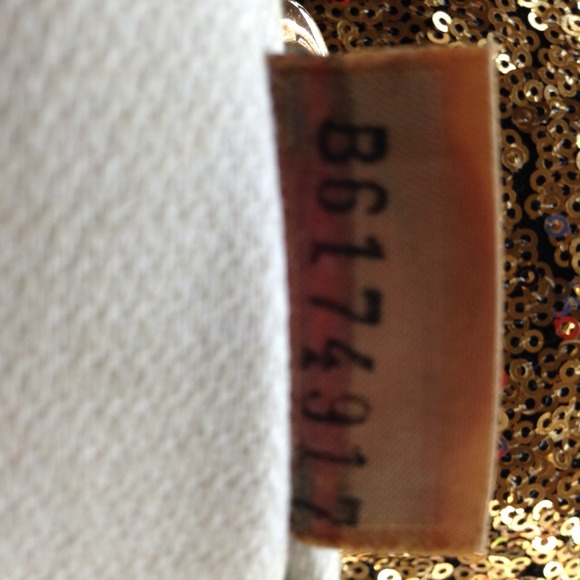 Authenticity code Dooney & Burke Leather Wristlet