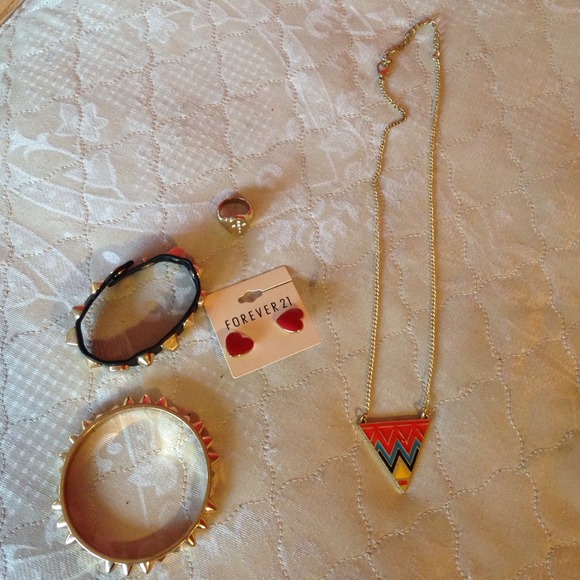 1 ring 2 bracelets 1 necklace 1 pair of earrings