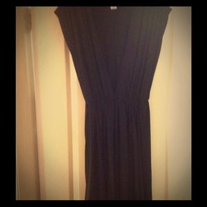 Black swim suit cover. Deep plunge neck.