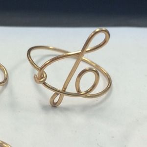 Custom made Treble Clef gold wire ring