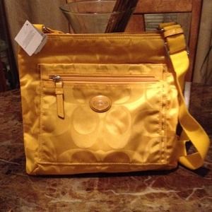 #108.  Coach Getaway Signature Nylon File Bag