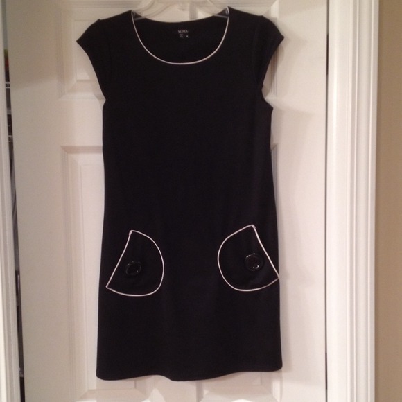 Black mini dress, sixties style,