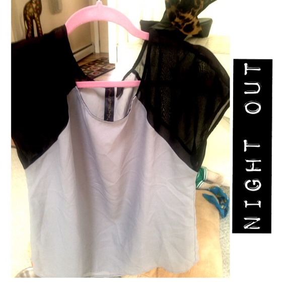 Gray black short sleeved sheer top.