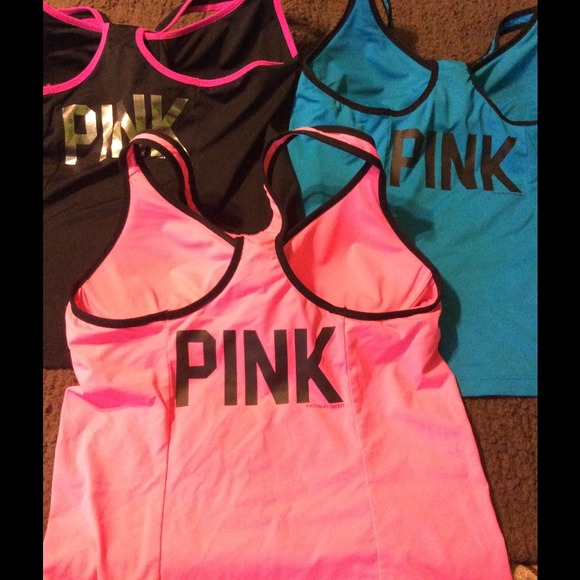 Like new VS Pink yoga tops. Pink, blue, and black.